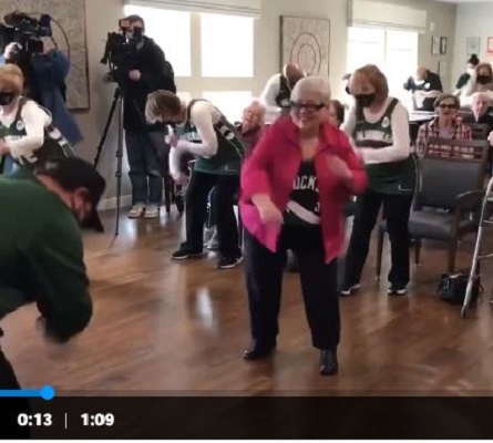 Judy Brannon dances with the Milwaukee Bucks Grand Dancers