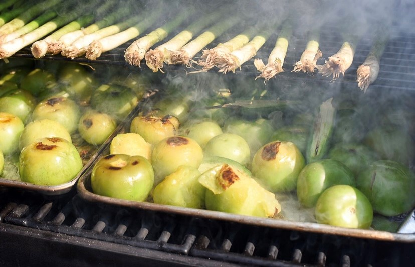 Tomatillos on smoker. Salsa Verde